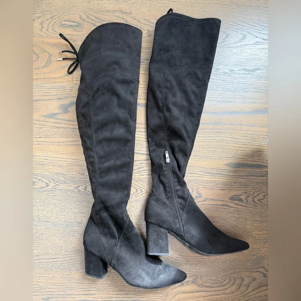 Marc Fisher black faux suede over-the-knee boots with a block heel and tie-back.